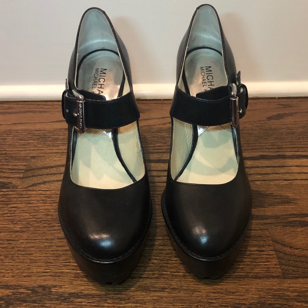Michael Kors Platform with a Silver buckle